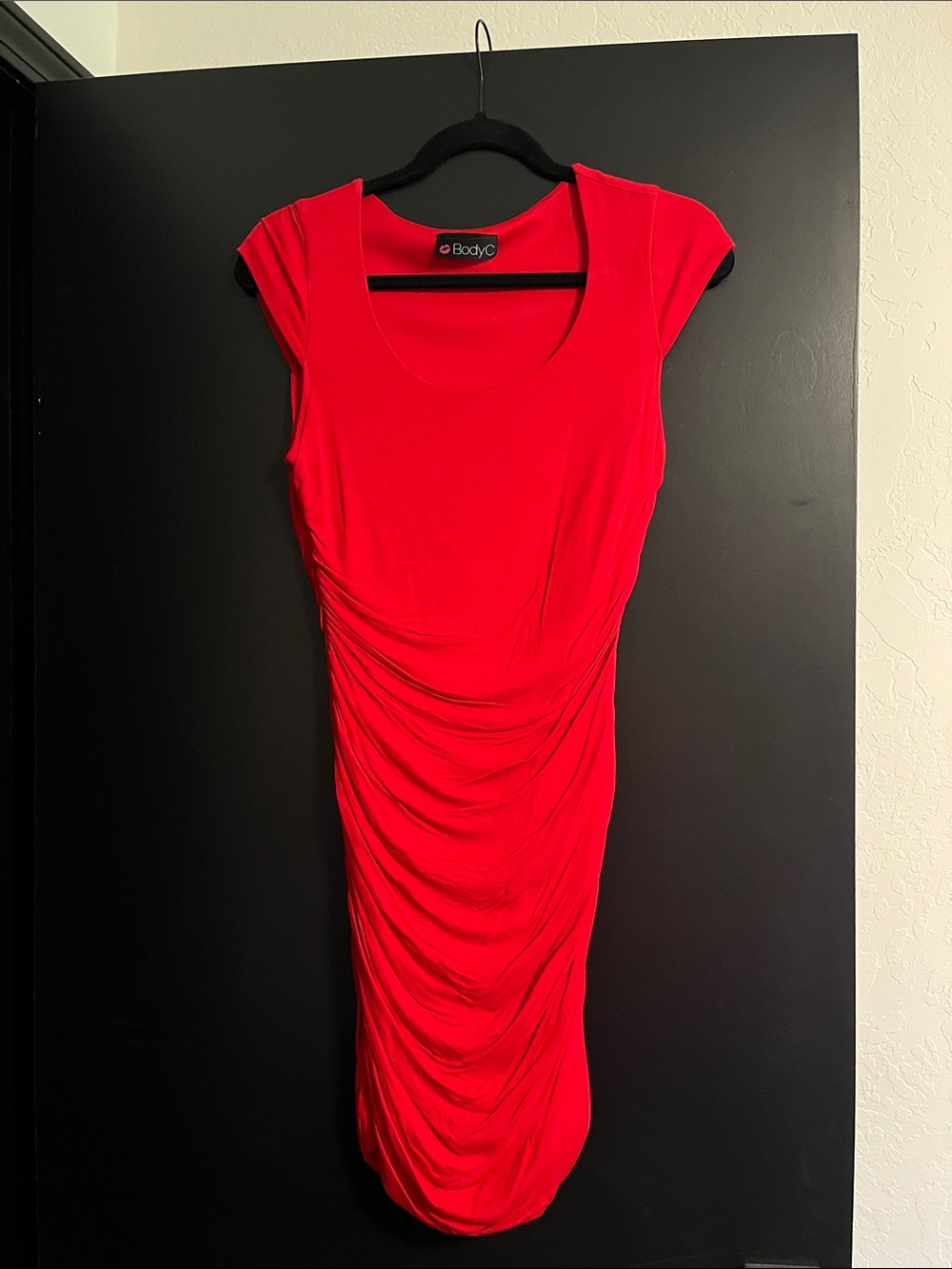 on Ruched Red Midi Dress by